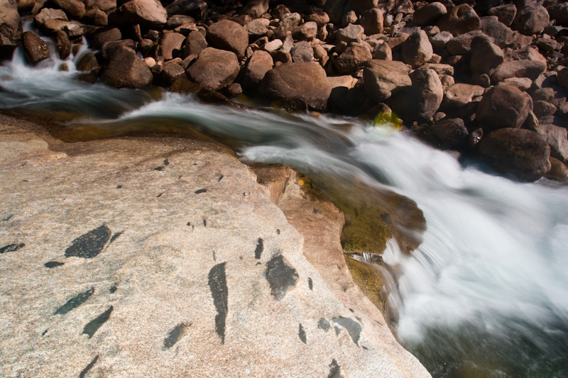 Water Flowing Over Rocks In The Merced River
